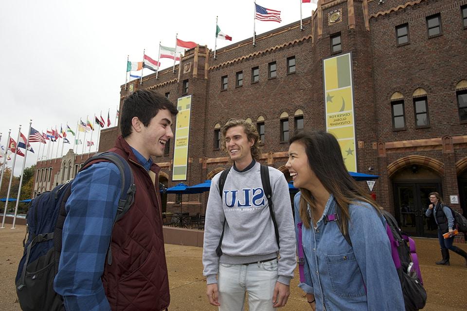 Students stand outside the Center for Global Citizenship